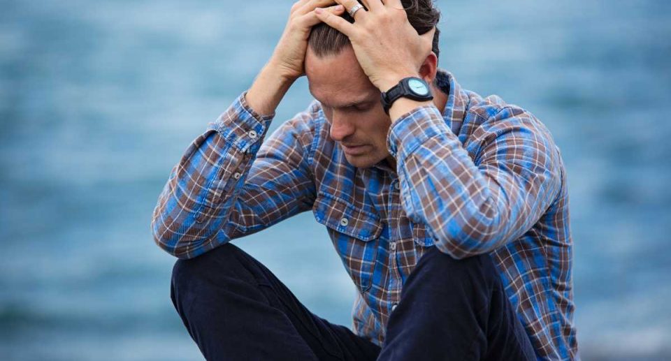 A man feeling depressed