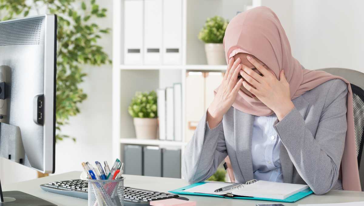 A woman depressed at work